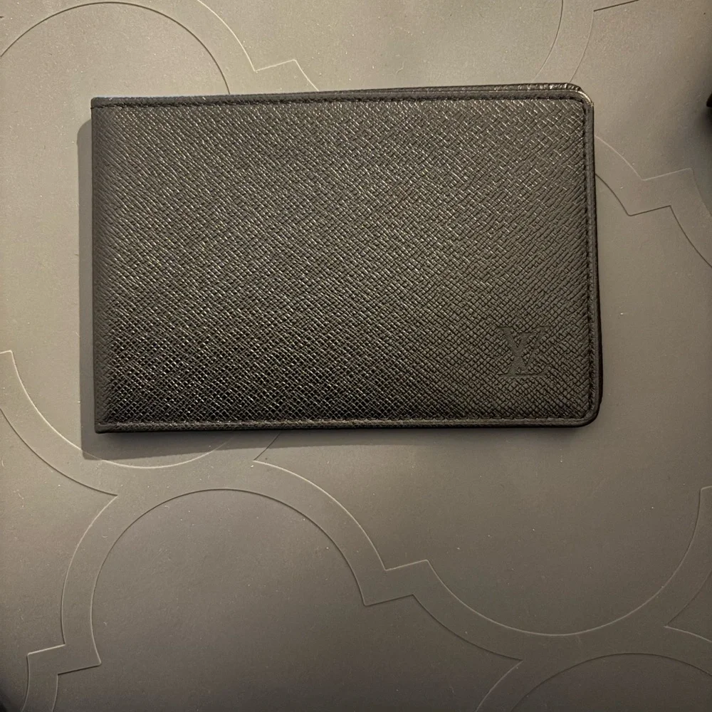 Vintage black Louis Vuitton passport holders‎